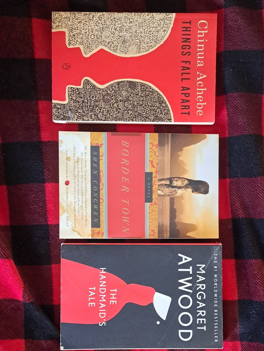 Set of 3 Paperback Novels — Things Fall Apart, Border Town & The Handmaid's Tale